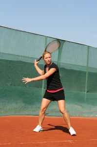 woman playing tennis 