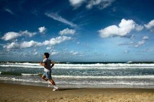 man running on beach