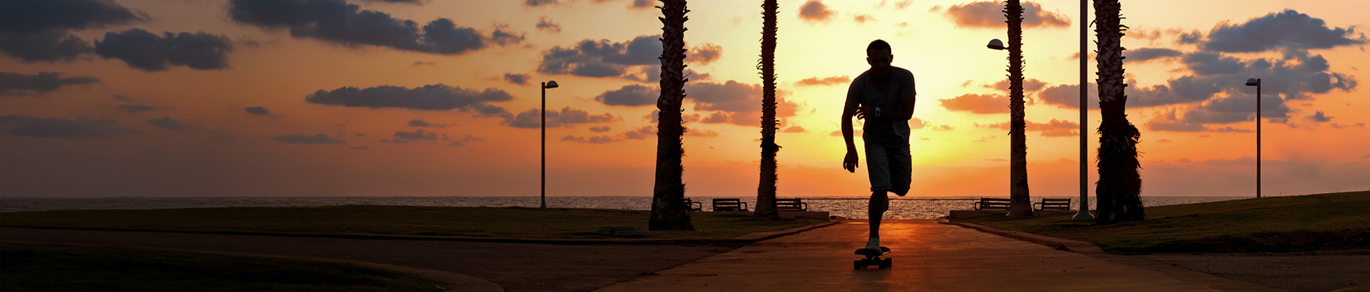lonboarder on the boardwalk